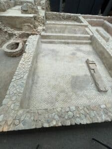 Valencia Old Town: History You Can Walk Through 1 Roman ruins beneath glass flooring at La Almoina Archaeological Museum in Valencia Old Town